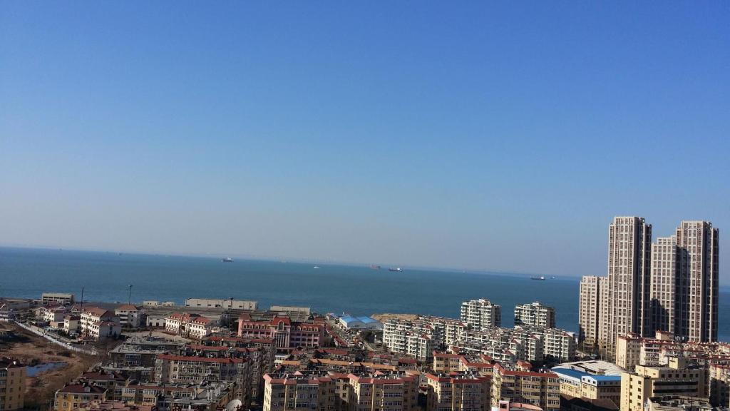 Super 8 Hotel Qingdao Railway Station Gui Zhou Road Esterno foto
